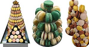 Estão expostas três torres de macarons: a primeira apresenta macarons em tons pastel empilhados num cone, a segunda tem macarons verdes e creme num suporte em camadas e a terceira apresenta guloseimas douradas, castanhas e cor-de-rosa - perfeitas para qualquer pastelaria fina.